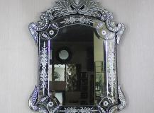 venetian and wooden frame mirror